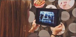 Tablet showing food photo within interactive lifestyle display
